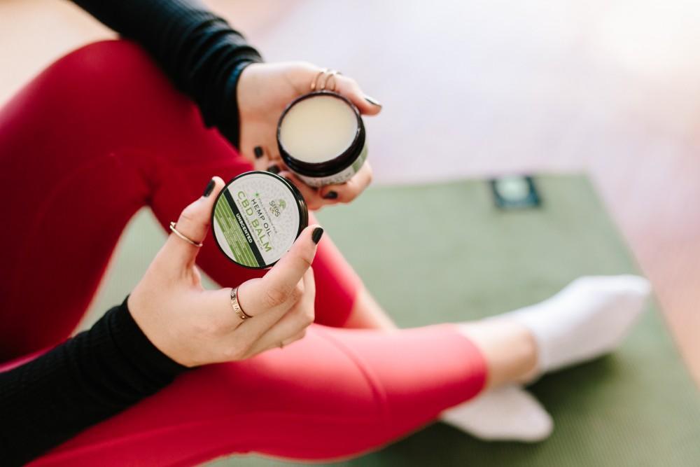 Women using CBD oil for foot
